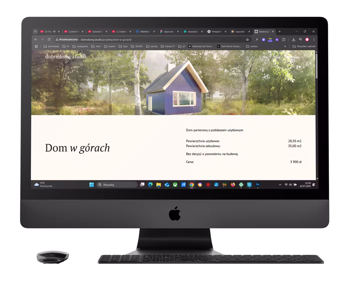 zdjęcie monitora wyświetlającego stronę dobre domy studio